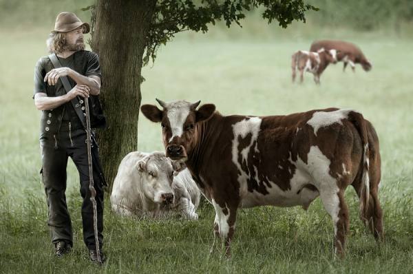 Photograph Jeannette Oerlemans The Calf And His Guardian on One Eyeland